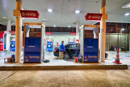 HONG KONG, CHINA - CIRCA JANUARY, 2019: an Esso station in Hong Kong at night. Esso is a trade name for ExxonMobil and its related companies.のeditorial素材
