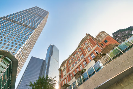 HONG KONG, CHINA - CIRCA JANUARY, 2019: low angle view of Former French Mission Building and skyscrapers in Hong Kong.のeditorial素材
