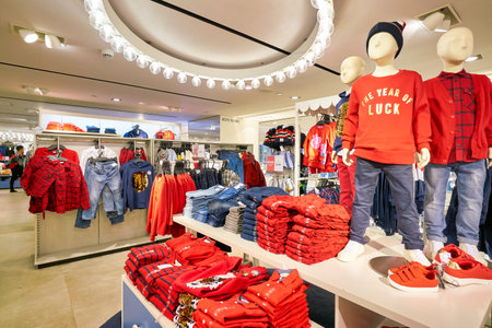 HONG KONG, CHINA - CIRCA JANUARY, 2019: interior shot of H&M store in Hong Kong. Hennes & Mauritz AB is a Swedish multinational clothing-retail company known for its fast fashion clothing.のeditorial素材