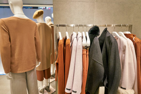 HONG KONG, CHINA - JANUARY 23, 2019: clothes on display at Giordano Ladies store in New Town Plaza. New Town Plaza is a shopping mall in the town centre of Sha Tin, Hong Kong.のeditorial素材