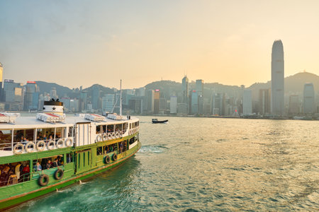 HONG KONG, CHINA - CIRCA JANUARY, 2019: a Star Ferry crossing Victoria Harbour. The Star Ferry is a passenger ferry service operator and tourist attraction in Hong Kong.のeditorial素材