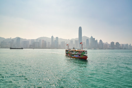 HONG KONG, CHINA - CIRCA JANUARY, 2019: a Star Ferry in Asia's World City livery crossing Victoria...