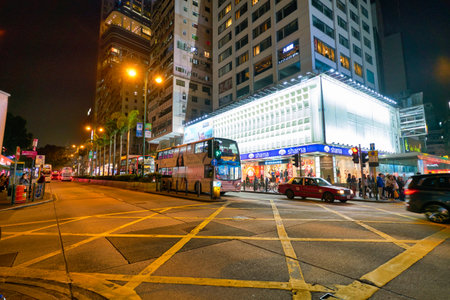 HONG KONG, CHINA - CIRCA JANUARY, 2019: street level view of Hong Kong at night.のeditorial素材