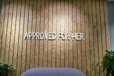 HONG KONG, CHINA - CIRCA JANUARY, 2019: "Approved for her" sign seen at a Foot Locker store in Hong Kong. Foot Locker Retail, Inc. is an American sportswear and footwear retailer.のeditorial素材