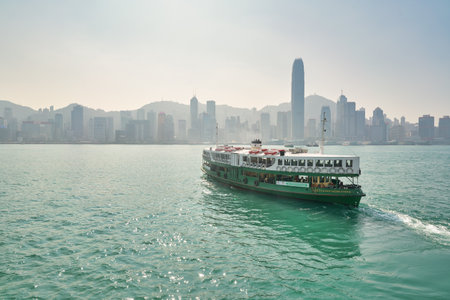 HONG KONG, CHINA - CIRCA JANUARY, 2019: a Star Ferry crossing Victoria Harbour. The Star Ferry is a...