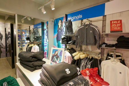 HONG KONG, CHINA - CIRCA JANUARY, 2019: clothes on display at Adidas store in Hong Kong.のeditorial素材
