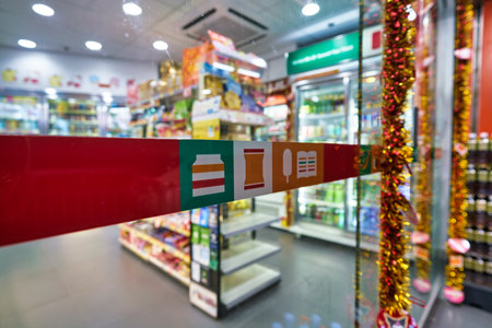 HONG KONG, CHINA - CIRCA JANUARY, 2019: close up shot of window at a 7-Eleven store in Hong Kong