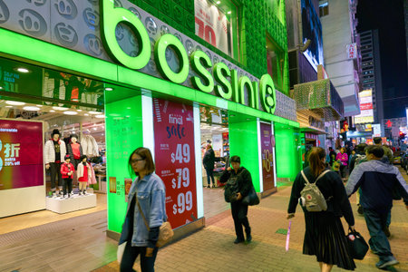 HONG KONG - JANUARY 22, 2019: Bossini shopfront in Hong Kong at nighttime.のeditorial素材