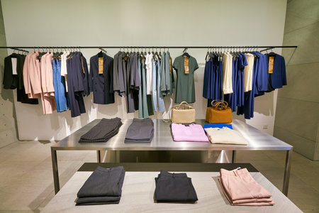 HONG KONG, CHINA - JANUARY 23, 2019: clothes on display at Theory store in New Town Plaza. New Town Plaza is a shopping mall in the town centre of Sha Tin, Hong Kong.のeditorial素材