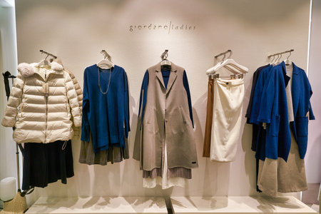 HONG KONG, CHINA - JANUARY 23, 2019: clothes on display at Giordano Ladies store in New Town Plaza. New Town Plaza is a shopping mall in the town centre of Sha Tin, Hong Kong.のeditorial素材