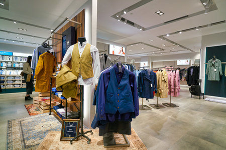 HONG KONG, CHINA - JANUARY 23, 2019: clothes on display at G2000 store in New Town Plaza. New Town Plaza is a shopping mall in the town centre of Sha Tin, Hong Kong.のeditorial素材