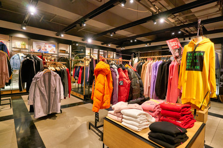 HONG KONG, CHINA - JANUARY 23, 2019: clothes on display at izzue store in New Town Plaza. New Town Plaza is a shopping mall in the town centre of Sha Tin, Hong Kong.のeditorial素材