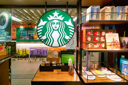 HONG KONG, CHINA - CIRCA JANUARY, 2019: Starbucks Coffee sign seen at a coffeeshop in Hong Kong.