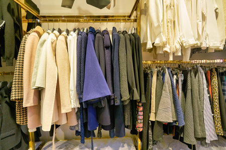 HONG KONG, CHINA - JANUARY 23, 2019: clothes on display at a store in New Town Plaza. New Town Plaza is a shopping mall in the town centre of Sha Tin, Hong Kong.のeditorial素材