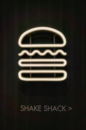 HONG KONG, CHINA - JANUARY 22, 2019: close up shot of Shake Shack sign seen at IFC mall in Hong Kong. Shake Shack is an American fast casual restaurant chain based in New York City.のeditorial素材
