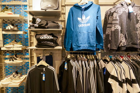 HONG KONG, CHINA - CIRCA JANUARY, 2019: clothes on display at Adidas store in Hong Kong.のeditorial素材