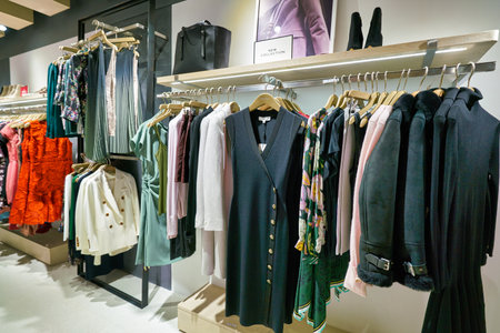 HONG KONG, CHINA - JANUARY 23, 2019: clothes on display at Reiss store in New Town Plaza. New Town Plaza is a shopping mall in the town centre of Sha Tin, Hong Kong.のeditorial素材