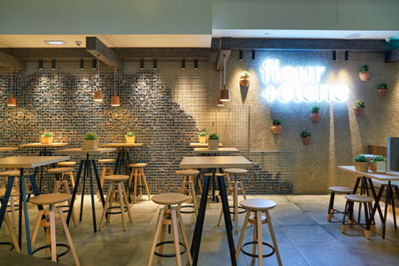 DUBAI, UAE - CIRCA JANUARY 2019: interior shot of Flour + Stone restaurant in Dubai International Airport.のeditorial素材