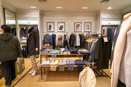 HONG KONG, CHINA - JANUARY 23, 2019: clothes on display at Club Monaco store in New Town Plaza. New Town Plaza is a shopping mall in the town centre of Sha Tin, Hong Kong.のeditorial素材