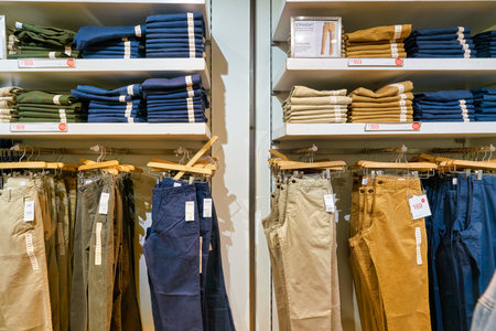 HONG KONG, CHINA - JANUARY 23, 2019: clothes on display at GAP store in New Town Plaza. New Town Plaza is a shopping mall in the town centre of Sha Tin, Hong Kong.のeditorial素材