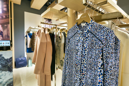 HONG KONG, CHINA - JANUARY 23, 2019: clothes on display at Reiss store in New Town Plaza. New Town Plaza is a shopping mall in the town centre of Sha Tin, Hong Kong.のeditorial素材