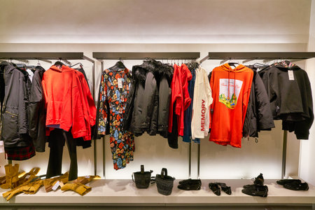 HONG KONG, CHINA - JANUARY 23, 2019: clothes on display at Zara store in New Town Plaza. New Town Plaza is a shopping mall in the town centre of Sha Tin, Hong Kong.のeditorial素材