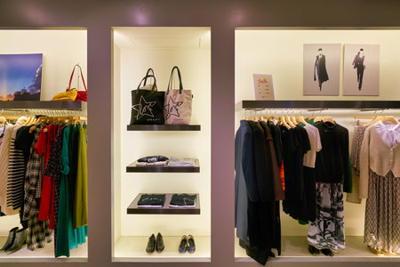 HONG KONG, CHINA - JANUARY 23, 2019: clothes on display at agnes b. store in New Town Plaza. New Town Plaza is a shopping mall in the town centre of Sha Tin, Hong Kong.のeditorial素材