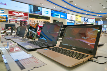 DUBAI, UAE - CIRCA JANUARY 2019: Asus laptops on display at Dubai International Airport.