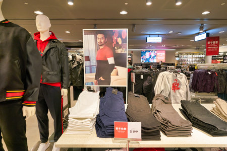 HONG KONG, CHINA - JANUARY 23, 2019: clothes on display at H&M store in New Town Plaza. New Town...