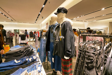 HONG KONG, CHINA - JANUARY 23, 2019: clothes on display at Zara store in New Town Plaza. New Town Plaza is a shopping mall in the town centre of Sha Tin, Hong Kong.のeditorial素材