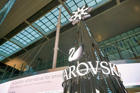 DUBAI, UAE - CIRCA JANUARY 2019: Swarovski sign seen at Dubai International Airport.のeditorial素材
