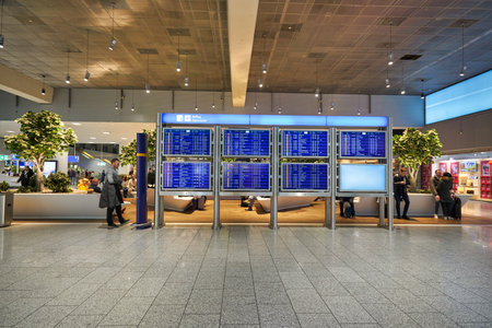 FRANKFURT AM MAIN, GERMANY - CIRCA JANUARY, 2020: flight schedule monitors as seen at Frankfurt am...