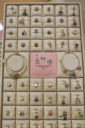 BERLIN, GERMANY - CIRCA SEPTEMBER, 2019: goods on display at Pandora store in Mall of Berlin. Pandora A/S is an international Danish jewellery manufacturer and retailerのeditorial素材