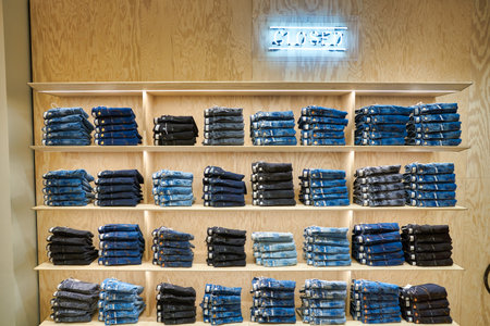 BERLIN, GERMANY - CIRCA SEPTEMBER, 2019: jeans on display at the Kaufhaus des Westens (KaDeWe) department store in Berlin.のeditorial素材
