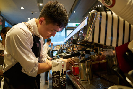 SHENZHEN, CHINA - CIRCA APRIL, 2019: barista prepare coffee in Pacific Coffee at UpperHills in Shenzhen.のeditorial素材