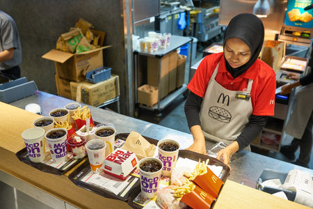 KUALA LUMPUR, MALAYSIA - CIRCA JANUARY, 2020: food served on trays at McDonald's restaurant in Kuala...