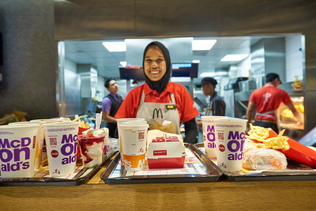 KUALA LUMPUR, MALAYSIA - CIRCA JANUARY, 2020: food served on trays at McDonald's restaurant in Kuala...