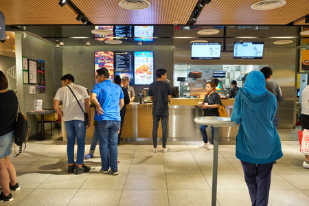 KUALA LUMPUR, MALAYSIA - CIRCA JANUARY, 2020: people at McDonald's restaurant in Kuala Lumpur.のeditorial素材