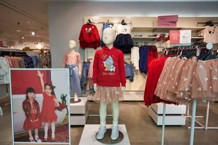 SINGAPORE - JANUARY 19, 2020: interior shot of H&M store in Singapore. H&M is a Swedish multinational clothing-retail company known for its fast-fashion clothing.のeditorial素材