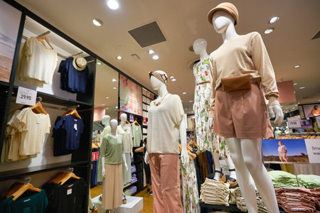 SINGAPORE - CIRCA JANUARY, 2020: interior shot of UNIQLO Orchard Central, Global Flagship Store. The store spans three floors and is located in Orchard Road shopping belt.のeditorial素材