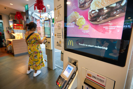 SINGAPORE - JANUARY 19, 2020: close up shot of self-ordering kiosk at McDonald's restaurant in...