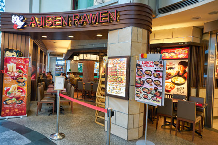 SINGAPORE - CIRCA JANUARY, 2020: entrance to Ajisen Ramen at Malay Street. Ajisen Ramen is a Japan-based chain of fast food restaurants selling Japanese ramen noodle soup dishes.のeditorial素材