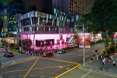SINGAPORE - CIRCA JANUARY, 2020: street level view of Singapore at nighttime.のeditorial素材