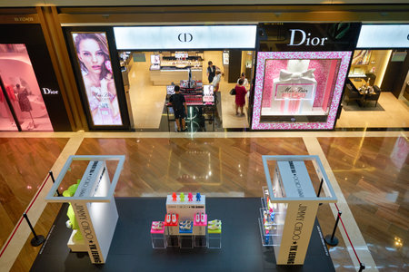 SINGAPORE - JANUARY 20, 2020: Christian Dior storefront in the Shoppes at Marina Bay Sands in Singapore. Dior is a French luxury goods company.のeditorial素材