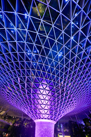 SINGAPORE - CIRCA JANUARY, 2020: view of the Rain Vortex, the world's largest and tallest indoor waterfall, standing at 40 metres at the Jewel Changi Airport.のeditorial素材