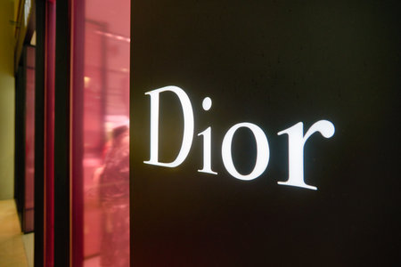 SINGAPORE - JANUARY 20, 2020: close up shot of Dior sign seen in the Shoppes at Marina Bay Sands. Christian Dior SE is a French luxury goods company.のeditorial素材