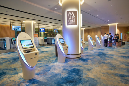 SINGAPORE - CIRCA JANUARY, 2020: self-service facilities at the Early Check-in Lounge at Jewel Changi Airport. Changi Airport is a major civilian airport that serves Singapore.のeditorial素材