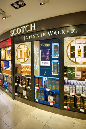 SINGAPORE - CIRCA JANUARY, 2020: a broad range of alcoholic drinks on display at Wines and Spirits store in Singapore Changi Airport.のeditorial素材
