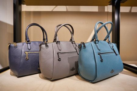SINGAPORE - CIRCA JANUARY, 2020: bags on display at Coach store in Singapore Changi Airport.のeditorial素材