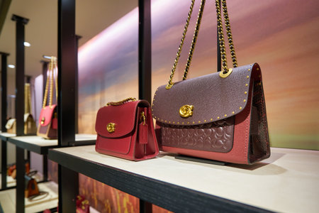 SINGAPORE - CIRCA JANUARY, 2020: bags on display at Coach store in Singapore Changi Airport.のeditorial素材
